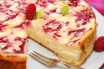 Wall Mural - cheesecake with raspberries and almonds