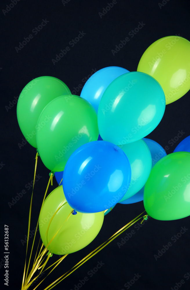 Colorful balloons isolated on black