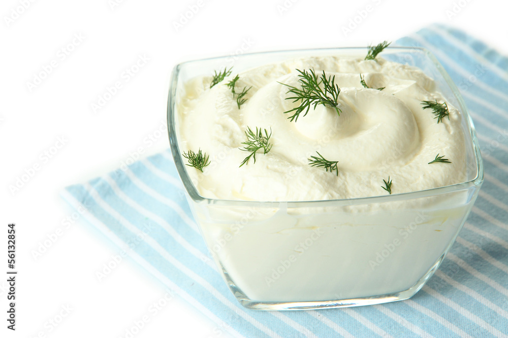 Sour cream in bowl close-up