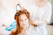 © Miramiska - Hair stylist makes the bride on the wedding day