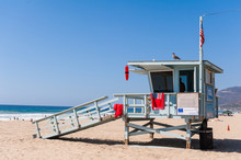 Life Guard Tower Under The Blue Sky In Malibu Beach