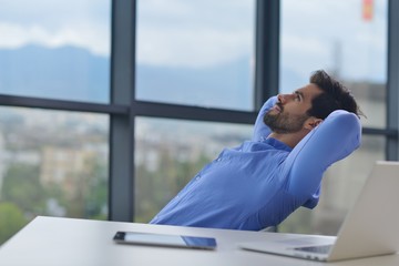 Wall Mural - happy young business man at office