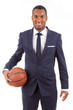Smiling Young business man holding a basketball, isolated on whi