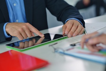 Wall Mural - business man using tablet compuer at office