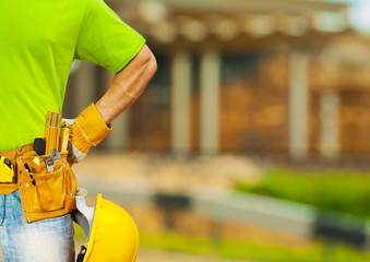 Wall Mural - tools in belt of worker close up