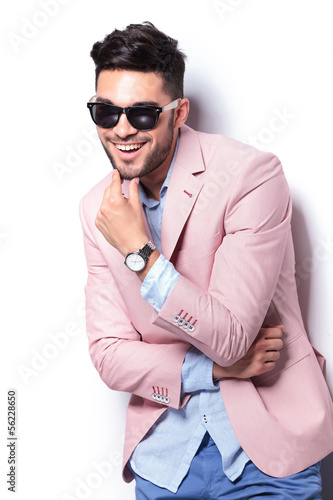 Fototapeta dla dzieci casual man laughing with hand on chin