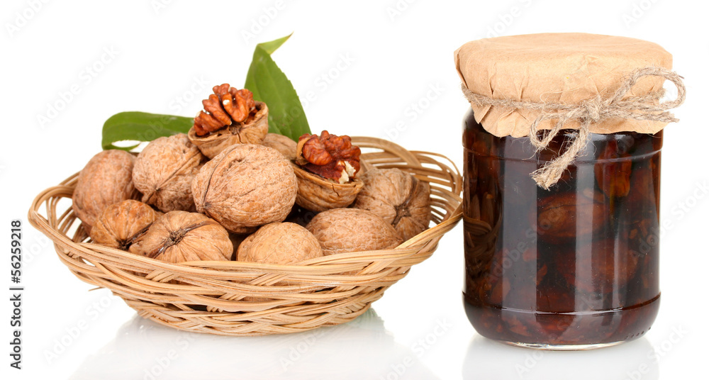 jam-jar of walnuts and a basket with walnuts