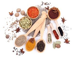 Wall Mural - Various spices and herbs isolated on white