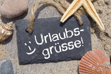 Kreidetafel mit Urlaubsgrüße