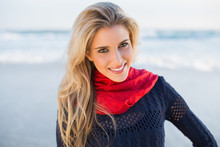 Cheerful Gorgeous Blonde With Red Scarf Posing