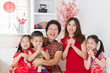 © WONG SZE FEI - Happy Asian family reunion at home.