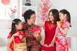 © WONG SZE FEI - Asian family celebrate Chinese new year at home.