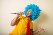 © Eugenio Marongiu - crazy funny young man with blue wig