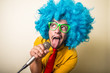 © Eugenio Marongiu - crazy funny young man with blue wig