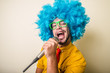 © Eugenio Marongiu - crazy funny young man with blue wig