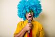 © Eugenio Marongiu - crazy funny young man with blue wig