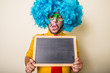 © Eugenio Marongiu - crazy funny young man with blue wig