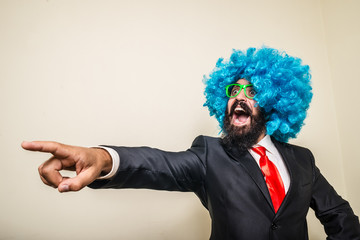 Canvas Print - crazy funny bearded man with blue wig