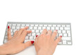 © Dmitry Lobanov - Hands typing on the remote wireless computer keyboard