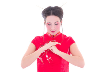 portrait of young attractive brunette in red japanese dress isol