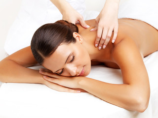 Wall Mural - Massage. Close-up of a Beautiful Woman Getting Spa Treatment