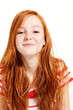 portrait of cute redheaded girl, white background