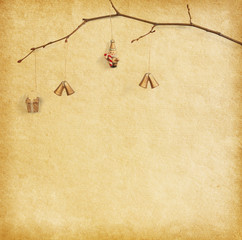 Sticker - christmas decoration hanging over paper  background