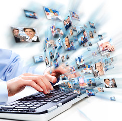 Aufkleber - Hands with laptop computer keyboard.