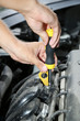 © Africa Studio - Hand with screwdriver. Auto mechanic in car repair