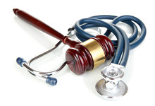 Medicine Law Concept. Gavel And Stethoscope Isolated On White