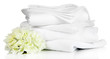 © Africa Studio - Stack of clean bedding sheets and towels isolated on white