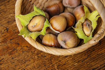 Wall Mural - hazelnuts on a basket