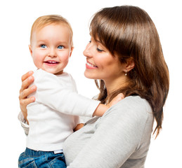 Fototapete - Happy Smiling Mother and Baby kissing and hugging at Home