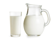 Milk Jug And Glass On White Background