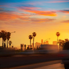 Fototapete - LA Los Angeles sunset skyline with traffic California