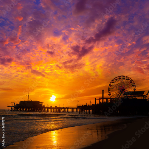 Naklejka samoprzylepna Santa Monica california zachód słońca na molo promów koła