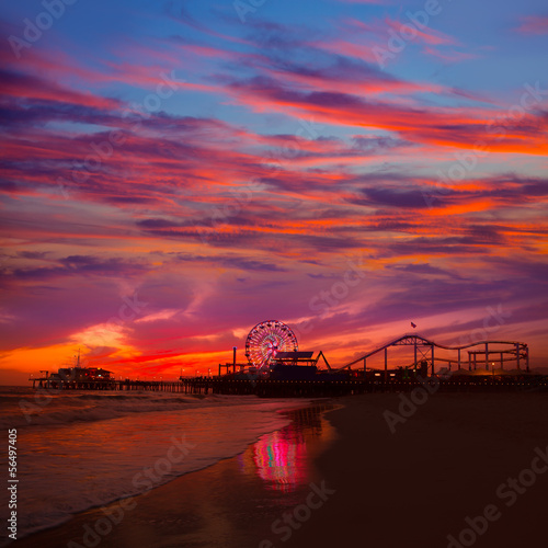 Naklejka samoprzylepna Santa Monica california zachód słońca na molo promów koła