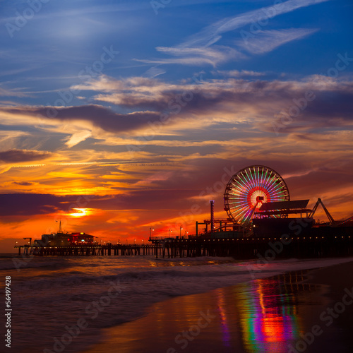 Naklejka samoprzylepna Santa Monica california zachód słońca na molo promów koła