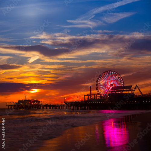 Naklejka samoprzylepna Santa Monica california zachód słońca na molo promów koła