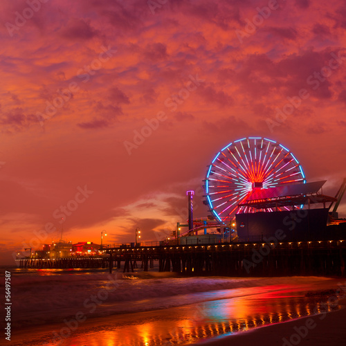 Naklejka samoprzylepna Santa Monica california zachód słońca na molo promów koła