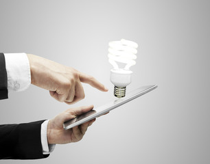 tablet and lightbulb