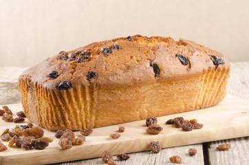 freshly baked loaf cake with raisins