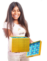 Wall Mural - surprised girl opening a present box on a white background