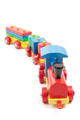 Wall Mural - Toy wooden train isolated on white