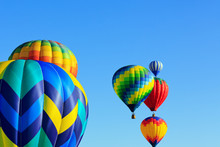 Hot Air Balloons Against Blue Sky