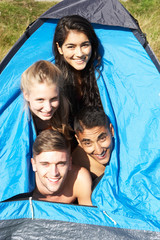 Wall Mural - Young Couples On Camping Trip In Countryside