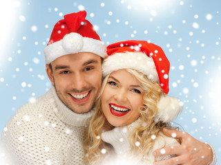 Poster - family couple in sweaters and santa's hats