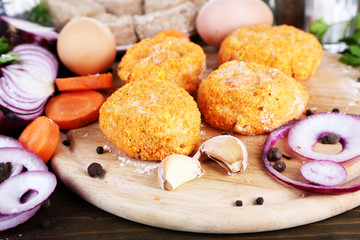 Poster - Meat patties on board on wooden table