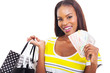 african woman holding a hand full of cash