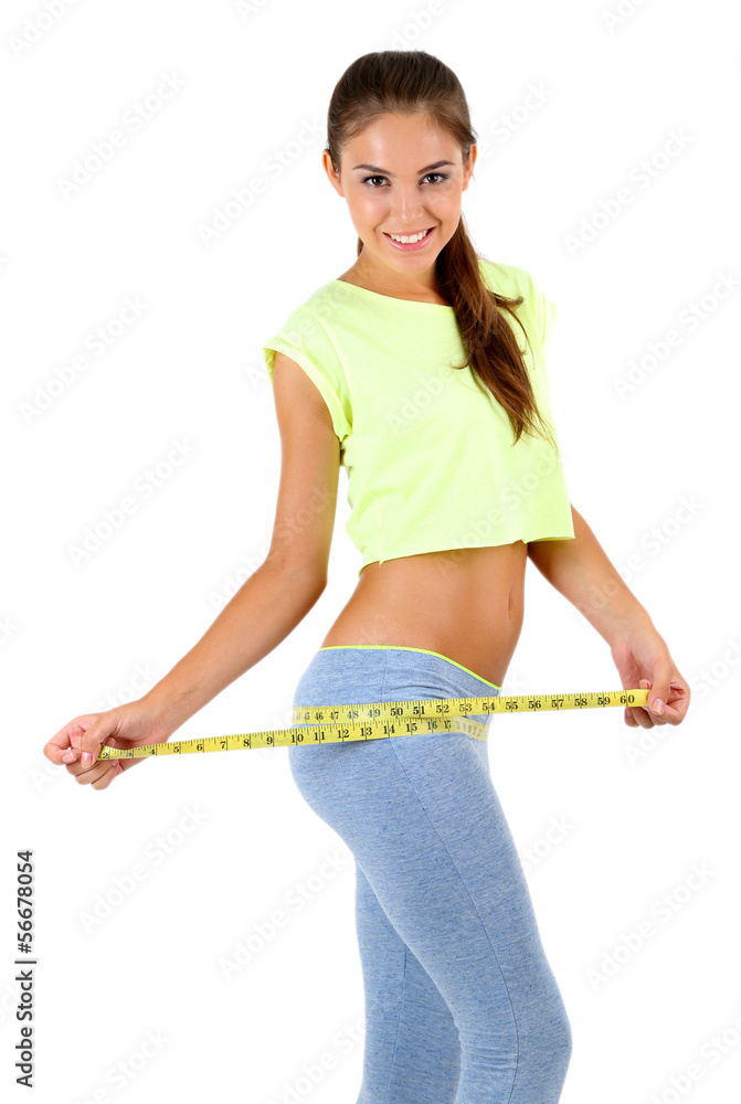 Slim girl with centimeter isolated on white